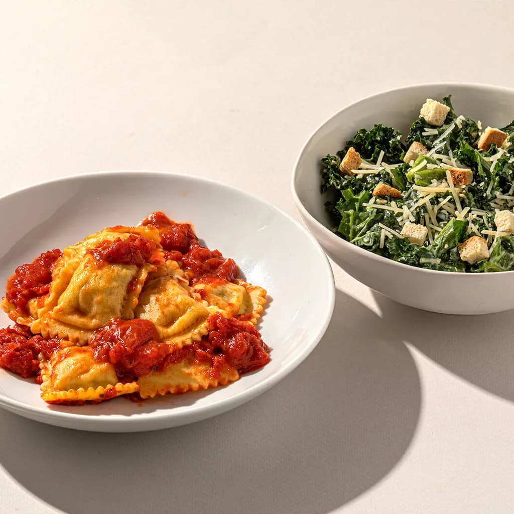 Beef Ravioli in Marinara with Kale Caesar Salad